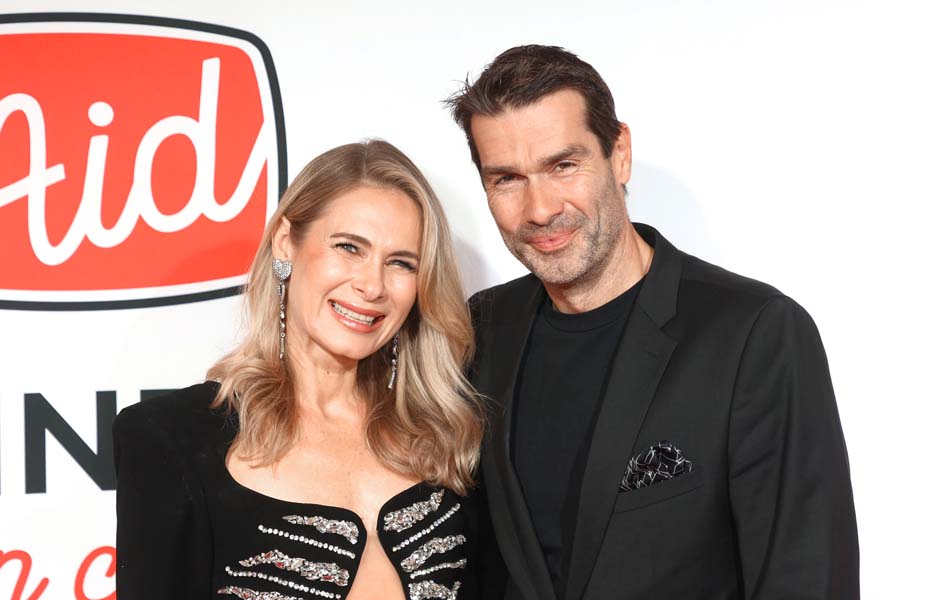 Influencerin Iryna Thater und Ehemann Martin Thater auf dem roten Teppich bei Channel Aid 2025 im Deutschen Schauspielhaus Hamburg – Stil, Erfolg und soziales Engagement.